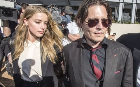 Actor Johnny Depp (R) and wife Amber Heard arrive at the Southport Magistrates Court on Australia's Gold Coast, April 18, 2016.  - Credit: Reuters