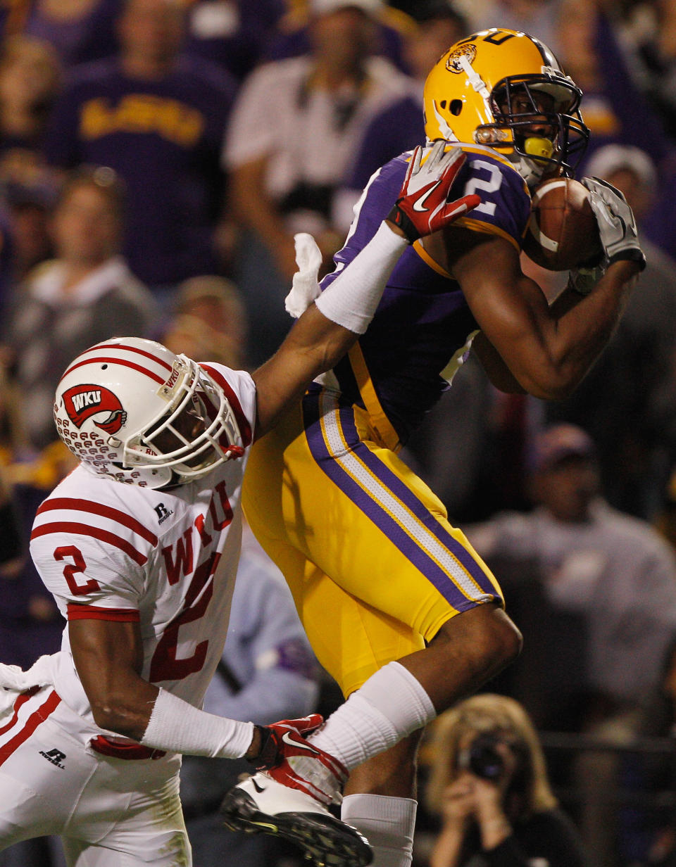 BATON ROUGE, LA - NOVEMBER 12: Rueben Randle #2 of the Louisiana State University Tigers catches a touchdown pass over Derrius Brooks #2 of the Western Kentucky Hilltoppers at Tiger Stadium on November 12, 2011 in Baton Rouge, Louisiana. (Photo by Chris Graythen/Getty Images)