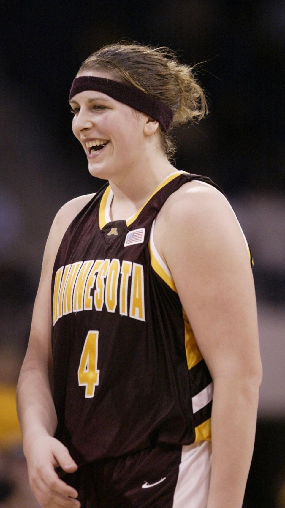 Minnesota's Janel McCarville leaves the court near the end of Minnesota's 76-63 victory over Boston College in their NCAA Mideast Regional semifinal game Sunday, March 28, 2004, at the Ted Constant Convocation Center in Norfolk, Va. McCarville led Minnesota with 25 points.