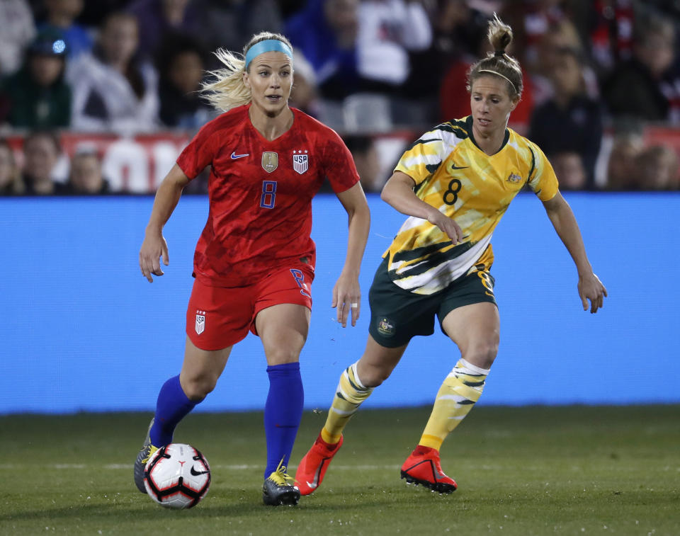 United States midfielder Julie Ertz, left, looks to pass the ball as Australia midfielder Elise Kellogg-Knight pursues during the first half of a friendly soccer match Thursday, April 4, 2019, in Commerce City, Colo. (AP Photo/David Zalubowski)