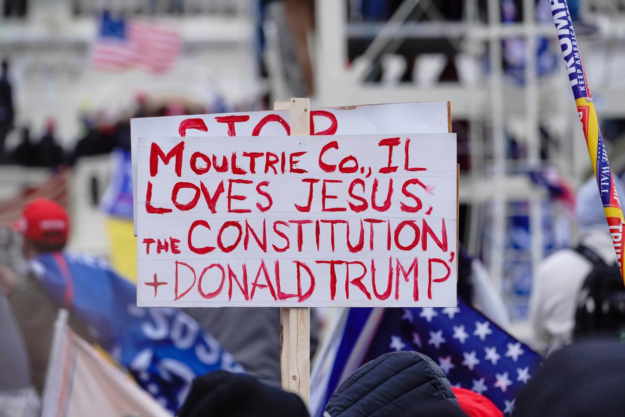 A sign referencing Jesus is held aloft during a "Stop the Steal" rally in support of President Donald Trump in Washington, D.C., on Jan. 6. (Photo: John Nacion/STAR MAX/IPx)