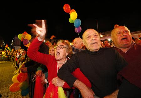 Gay rights activists jeer at opposition members of parliament, who abstained during a vote to recognise same-sex partnerships, in Valletta April 14, 2014. REUTERS/Darrin Zammit Lupi