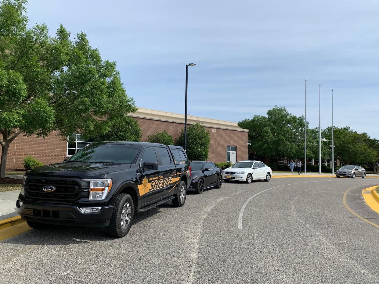 A New Hanover County Sheriff's Office vehicle is parked outside Ashley High School on May 5, 2023.