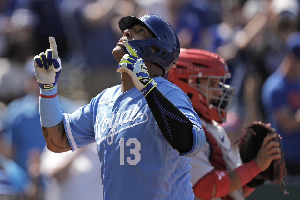 Kansas City Royals' Salvador Perez celebrates as he crosses the plate after hitting a solo home run during the third inning of a baseball game against the Washington Nationals Saturday, May 27, 2023, in Kansas City, Mo. (AP Photo/Charlie Riedel)