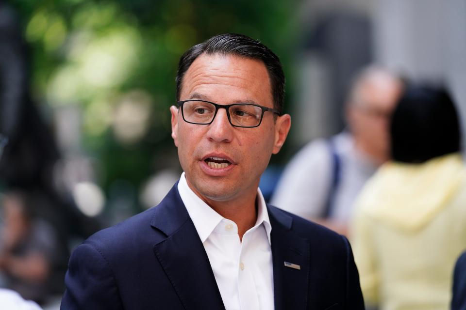 Pennsylvania candidate for governor, state Attorney General Josh Shapiro, speaks with people after a news conference discussing protecting abortion access, in Philadelphia on June 29, 2022.