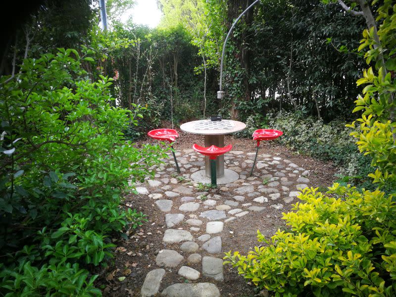 A view of a corner of Gianni Reffo's garden where he often plays checkers with his 9 year-old granddaughter, in Emilia Romagna