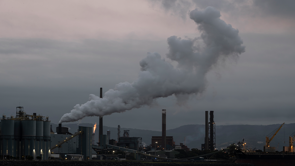 A huge plume of smoke coming from steel manufacturing in Wollongong.