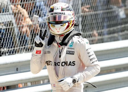 Britain Formula One - F1 - British Grand Prix 2016 - Silverstone, England - 10/7/16 Mercedes' Lewis Hamilton celebrates after winning the race REUTERS/Andrew Boyers Livepic EDITORIAL USE ONLY.