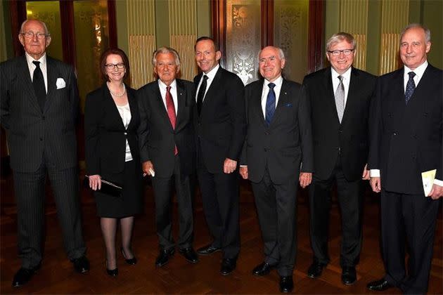 Fraser (left) posing for a photograph with former prime ministers of Australia (left to right) Julia Gillard, Bob Hawke, Prime Minister Tony Abbott, John Howard, Kevin Rudd and Paul Keating at the completion of the memorial service for former Prime Minister, Gough Whitlam, at the Town Hall in Sydney. Photo: AAP