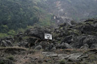 A backboard is seen at the site of Beichuan Middle School which was buried by boulders in the 2008 Sichuan earthquake in the city of Beichuan, Sichuan province, China, April 4, 2018. REUTERS/Jason Lee