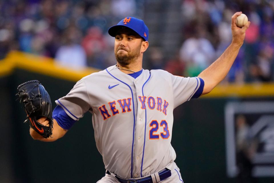 New York Mets starting pitcher David Peterson (23) throws against the Arizona Diamondbacks during the first inning of a baseball game, Friday, April 22, 2022, in Phoenix.