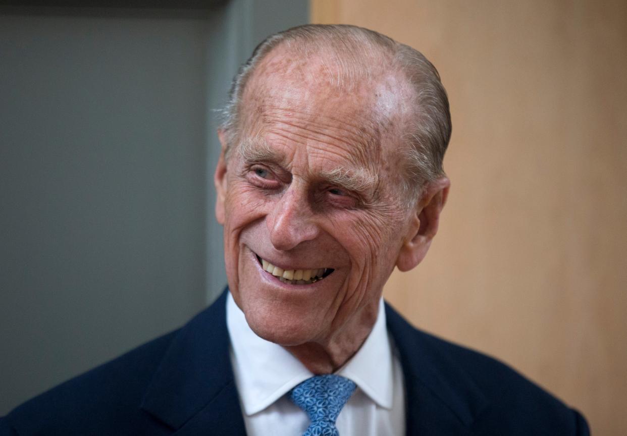 Prince Philip, the husband of Queen Elizabeth II, smiles after unveiling a plaque at the end of his visit to Richmond Adult Community College in Richmond (AP)