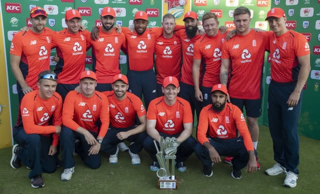 England players pose with their latest trophy