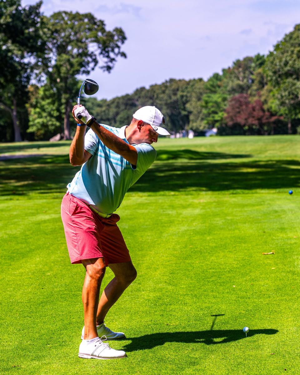 Mark Giusti drives from the tee on Hole Nine at the Country Club of New Bedford Fourball Tournament.