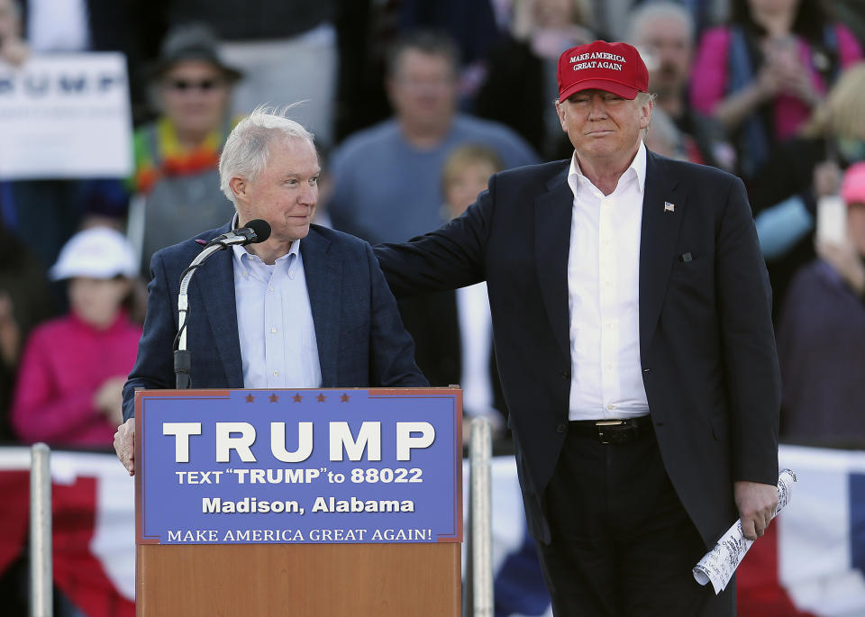 Trump stands next to then-Sen. Jeff Sessions, R-Ala., at a rally in Madison, Ala., on Feb. 28, 2016. (AP Photo/John Bazemore, File)