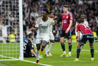 Real Madrid's Vinicius Junior celebrates after scoring his side's first goal during a Spanish La Liga soccer match between Real Madrid and Celta Vigo at the Santiago Bernabeu stadium in Madrid, Spain, Sunday, March 10, 2024. (AP Photo/Manu Fernandez)