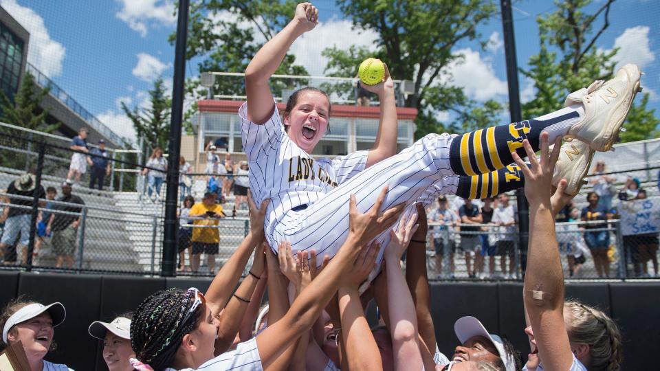 Clayton’s pitcher Meadow Lake is hoisted by her teammates after Clayton defeated Weehawken in the Group 1 softball championship game played at Ivy Hill Park in Newark on Saturday, June 4, 2022.