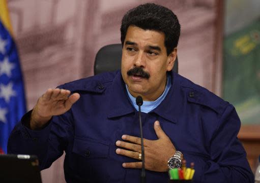 El presidente venezolano, Nicolás Maduro, habla durante una conferencia de prensa, el 21 de febrero de 2014 en Caracas (AFP | Juan Barreto)