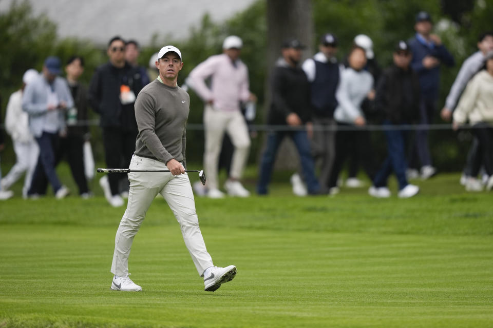 Rory McIlroy walks along the first fairway during the third round of the Genesis Invitational golf tournament at Riviera Country Club Saturday, Feb. 17, 2024, in the Pacific Palisades area of Los Angeles. (AP Photo/Ryan Sun)
