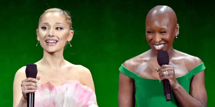 ariana grande cynthia erivo pink green outfits