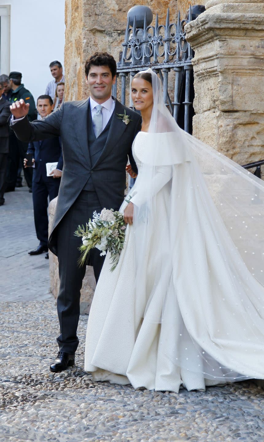 <p>Lady Charlotte Wellesley, the daughter of the Duke of Wellington, married billionaire Alejandro Santo Domingo wearing an Emilia Wickstead dress in Íllora, Spain. </p>