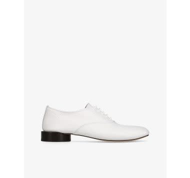 <p><a href="https://go.redirectingat.com?id=74968X1596630&url=https%3A%2F%2Fwww.repetto.com%2Fus%2Foxford-jacquemus-x-repetto-white-leather-v4196ve-050-us.html&sref=https%3A%2F%2F" rel="nofollow noopener" target="_blank" data-ylk="slk:Shop Now;elm:context_link;itc:0;sec:content-canvas" class="link rapid-noclick-resp">Shop Now</a></p><p>x Jacquemus Zizi Oxford Shoes</p><p>repetto.com</p><p>$560.00</p>