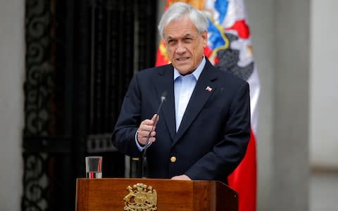 President Pinera, in office since 2017, has been criticised for failing to grasp the severity of the crisis - Credit: AFP