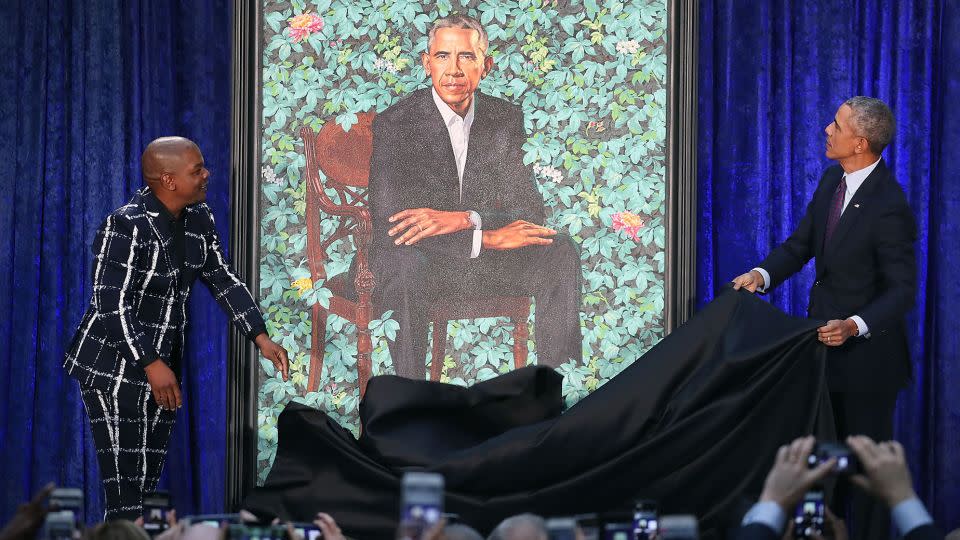 Kehinde Wiley and former President Barack Obama unveil his presidential portrait during a ceremony at the Smithsonian's National Portrait Gallery, on February 12, 2018 in Washington, DC. - Mark Wilson/Getty Images