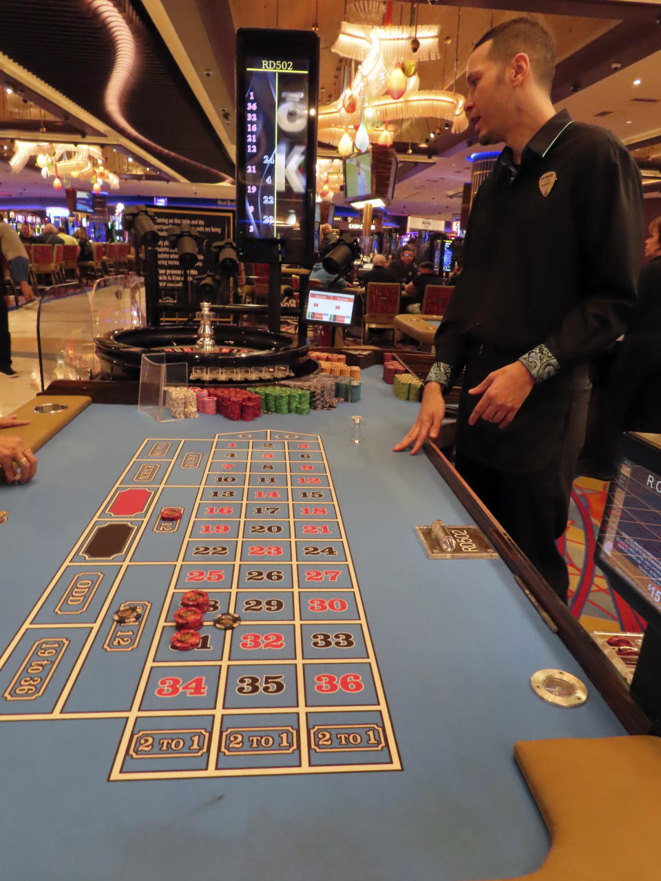 A dealer conducts a game of roulette at the Hard Rock casino in Atlantic City N.J., on May 17, 2023. On July 14, New Jersey gambling regulators released figures showing that Atlantic City's nine casinos, the three horse tracks that take sports bets and their online partners won over $457 million in June, an increase of 13.9% from a year earlier. (AP Photo/Wayne Parry)