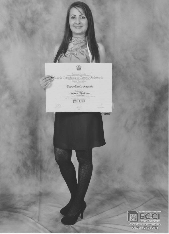 Diana pictured holding certification of completion of studies. (Courtesy: Diana)