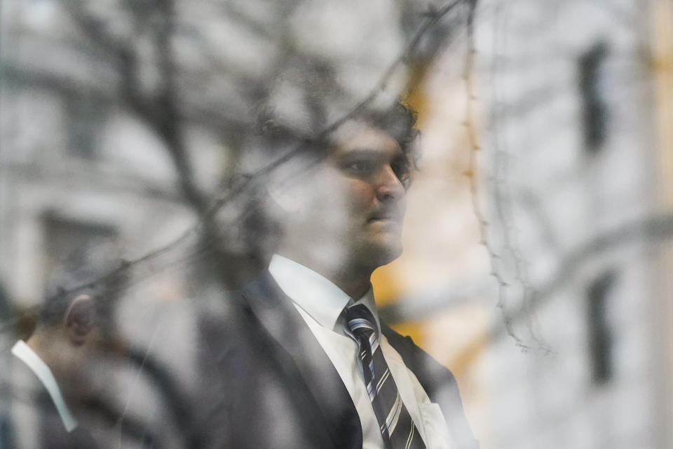 Samuel Bankman-Fried arrives to Manhattan federal court in New York, Thursday, Feb. 9, 2023, in New York. (AP Photo/John Minchillo)