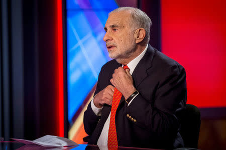 FILE PHOTO: Billionaire activist-investor Carl Icahn gives an interview on FOX Business Network's Neil Cavuto show in New York, U.S. on February 11, 2014. REUTERS/Brendan McDermid/File Photo