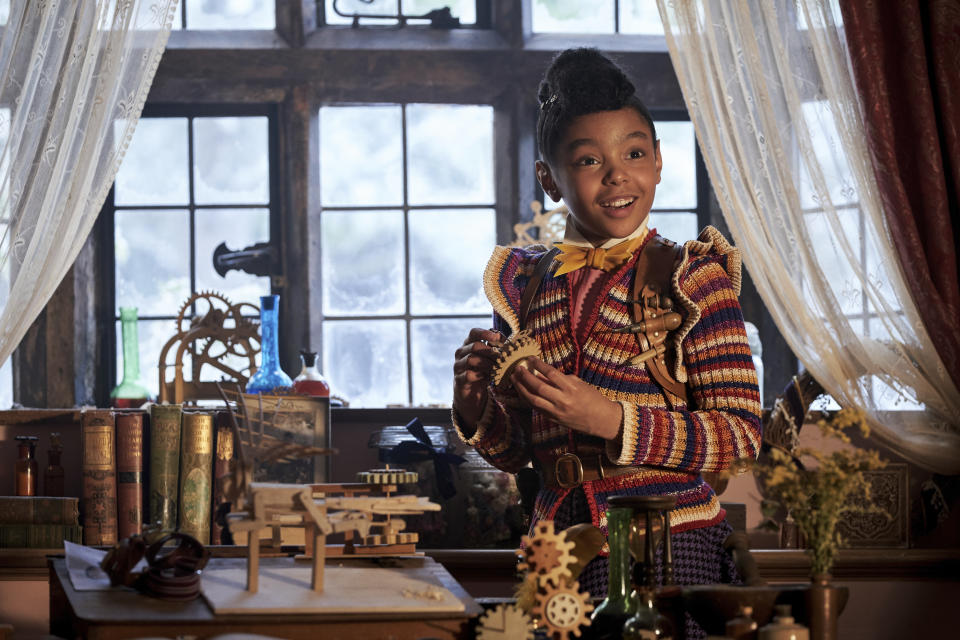 This image released by Netflix shows Madalen Mills as Journey Jangle in a scene from the holiday special "Jingle Jangle: A Christmas Journey. (Gareth Gatrell/Netflix via AP)