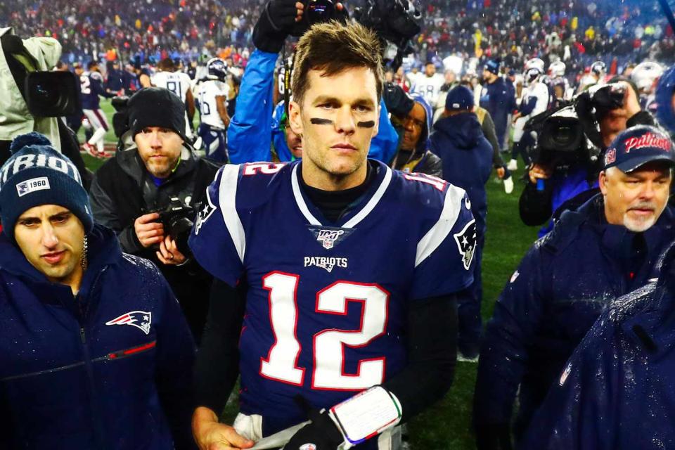 <p>Adam Glanzman/Getty </p> Tom Brady