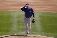 Texas Rangers starting pitcher Kohei Arihara, of Japan, steps on the mound during the first inning of a spring training baseball game against the Chicago White Sox Tuesday, March 2, 2021, in Phoenix. (AP Photo/Ross D. Franklin)