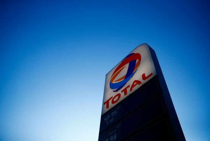 The logo of French oil and gas company Total is seen in a petrol station in Paris