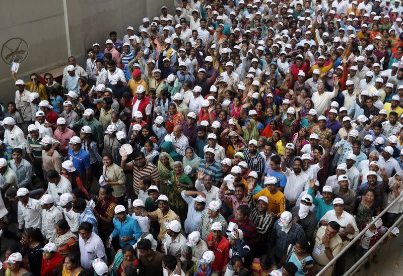 People leave the Sardar Patel Stadium after U.S. President Donald Trump and Indian Prime Minister Narendra Modi addressed a "Namaste Trump" event in Ahmedabad