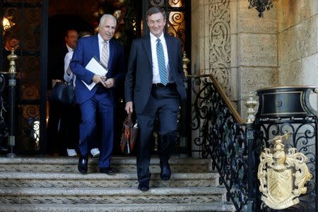 Johns Hopkins Medicine CEO Paul Rothman (L) and Mayo Clinic CEO John Noseworthy (R) depart after meeting with U.S. President-elect Donald Trump at the Mar-a-Lago Club in Palm Beach, Florida, U.S. December 28, 2016. REUTERS/Jonathan Ernst