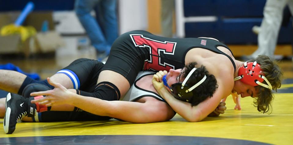 Hilton's Phil Testa, right, wrestles Brockport's Austin Boff in the final of the 152-pound weight class during the Teike-Bernabi Wrestling Tournament, Friday, Dec. 29, 2023.