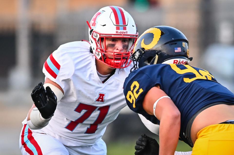 Arrowhead offensive lineman Garrett Sexton (71) prepares to block Marquette defensive lineman Cole Fischer (92) in a game Thursday, August 17, 2023, at Hart Park in Wauwatosa, Wisconsin.