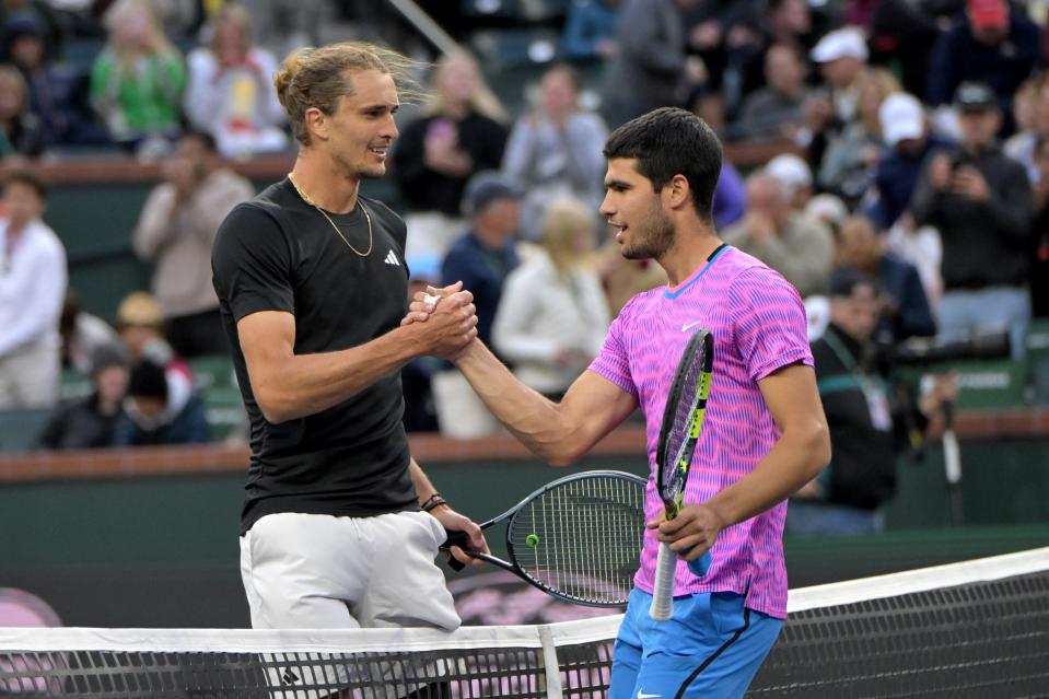 Alexander Zverev, left, and Carlos Alcaraz will face off in the 2024 French Open men's singles final. They most recently played against each other in the quarterfinals of the BNP Paribas Open, shown here, on March 14, 2024.