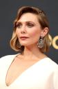 <p>A masterclass in modern Hollywood glamour, Elizabeth Olsen's hair by Adir Abergel was freshly cut into a bob and styled in crisp vintage waves. Her make-up, by artist Pati Dubroff, centred on muted neutrals, bringing an element of minimal Nineties style to the look. </p>