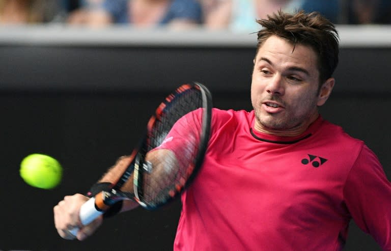 Switzerland's Stan Wawrinka in action against Martin Klizan of Slovakia in the first round of the Australian Open in Melbourne on January 16, 2017