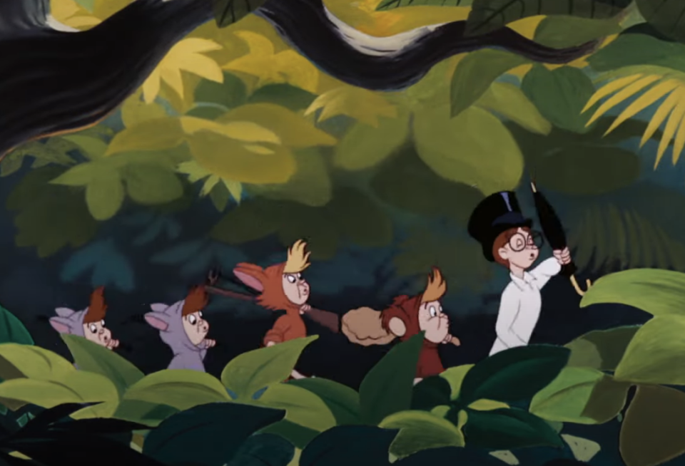 the kids following peter pan in the forest