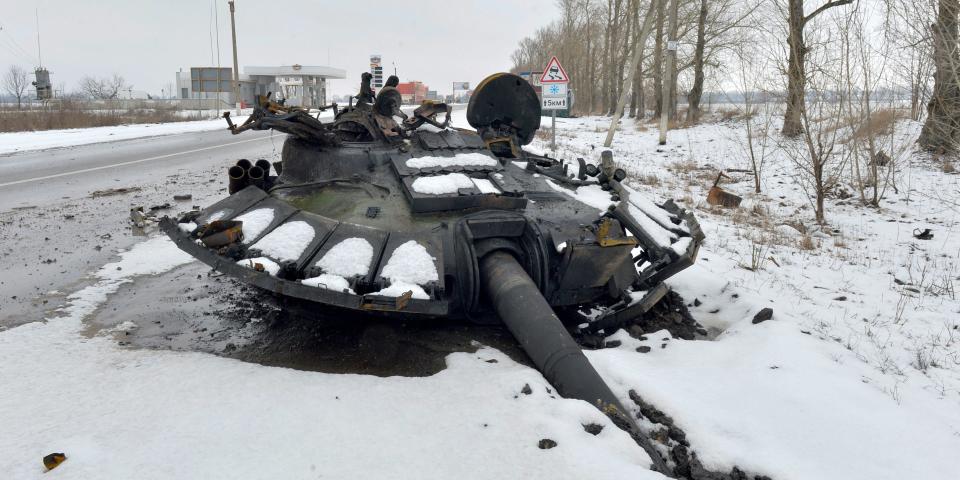 A fragment of a destroyed Russian tank is seen on the roadside on the outskirts of Kharkiv on February 26, 2022, following the Russian invasion of Ukraine.