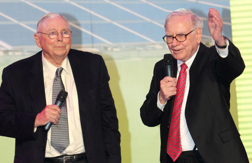 BEIJING - SEPTEMBER 29: (CHINA OUT)  Berkshire Hathaway Vice-Chairman Charles Thomas Munger (L) and Berkshire Hathaway CEO Warren E. Buffett attend a BYD Co Ltd new product launch conference at China World Hotel on September 29, 2010 in Beijing, China. BYD, an electric car and battery maker, recently received a boost when Buffet delievered favorable remarks about the company during an event hosted by BYD.  (Photo by Visual China Group via Getty Images)