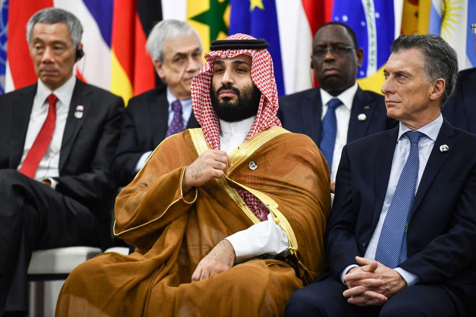 Mohammed bin Salman, center, and Mauricio Macri