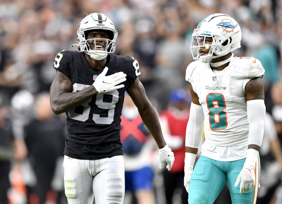 LAS VEGAS, NEVADA - SEPTEMBER 26: Bryan Edwards #89 of the Las Vegas Raiders reacts during overtime as Jevon Holland #8 of the Miami Dolphins looks on at Allegiant Stadium on September 26, 2021 in Las Vegas, Nevada. (Photo by Chris Unger/Getty Images)