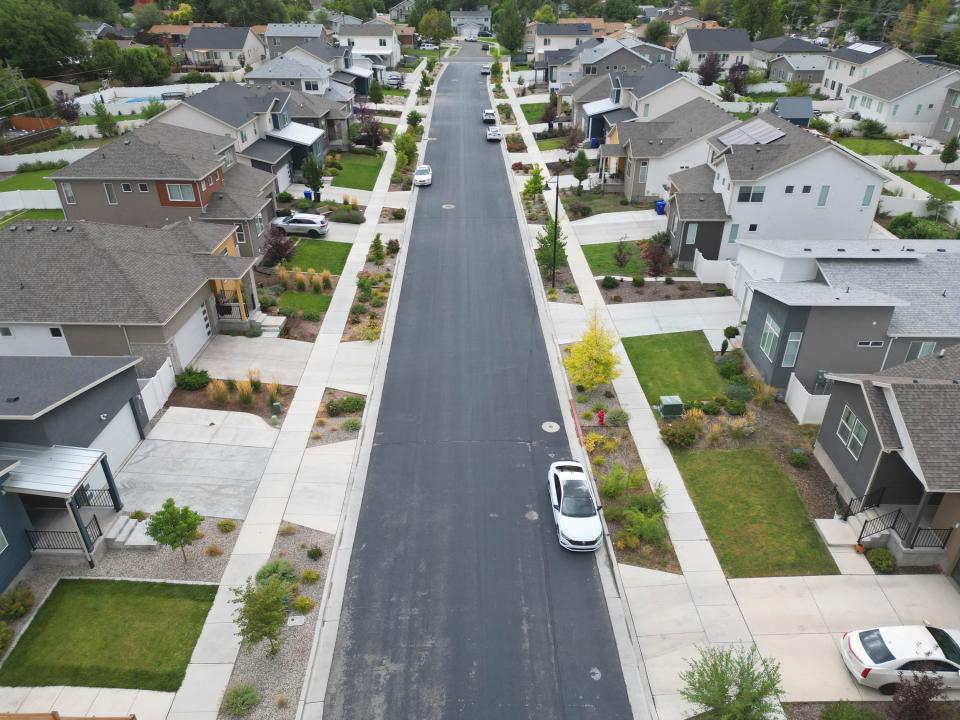 An aerial view of a group of Garbett Homes in South Salt Lake shows an entire neighborhood using low-water landscapin on Sept. 22, 2023. | Jake Young