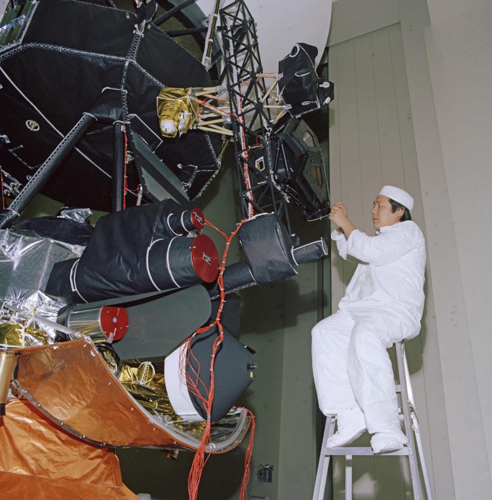 An engineer works on vibration acoustics and pyro shock testing for one of NASA's Voyager spacecraft on November 18, 1976.